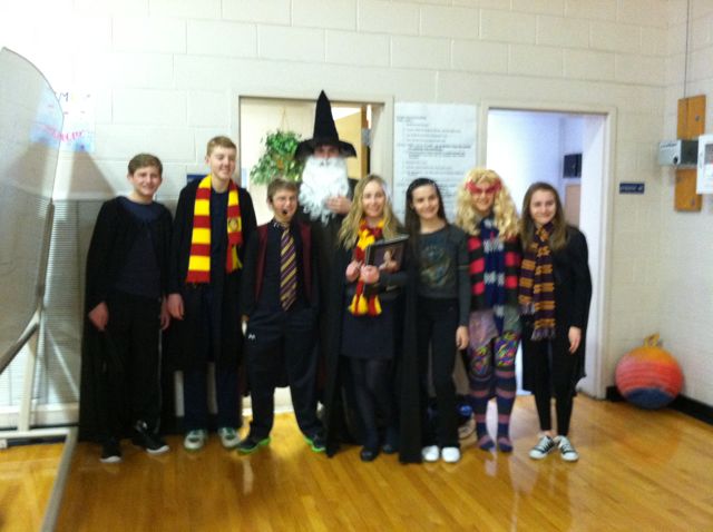 Sara and her 8th grade classmates perform Sara's first effort as a playwrite, for their school pep rally "Harry Potter comes to St. Mary's"... 